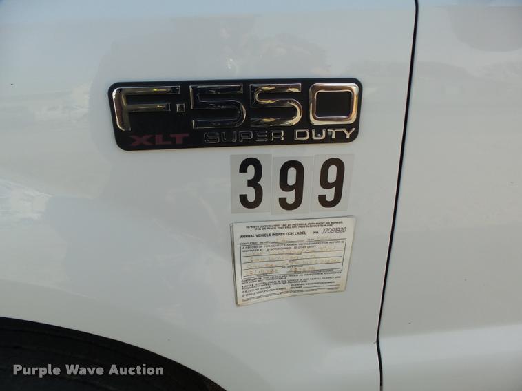 image for item L4100 1999 Ford F550 Super Duty XLT Crew Cab flatbed truck