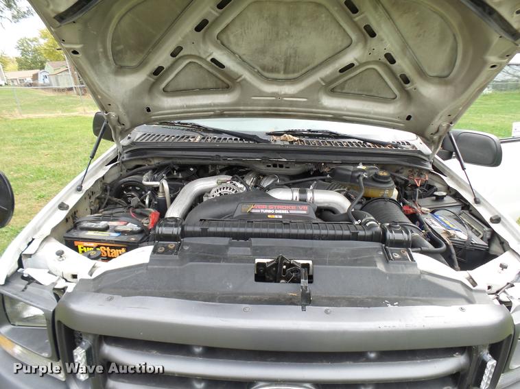 image for item L7146 2004 Ford F250 Super Duty flatbed pickup truck