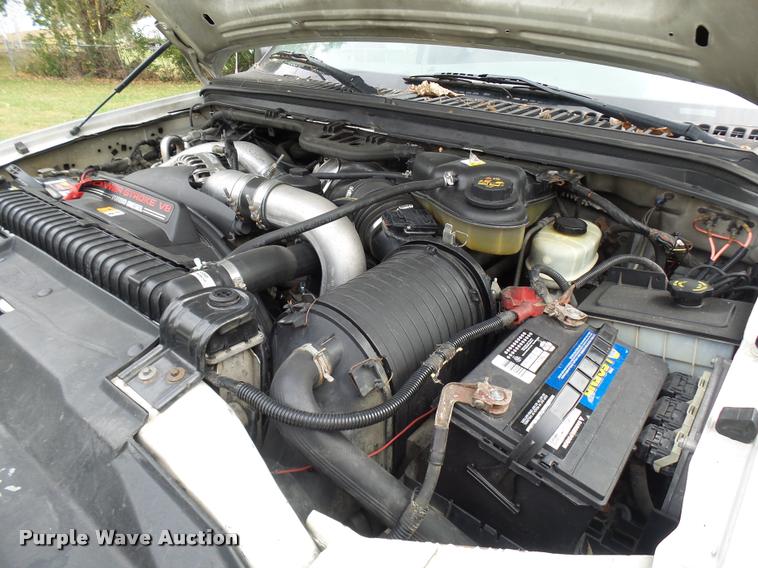 image for item L7146 2004 Ford F250 Super Duty flatbed pickup truck