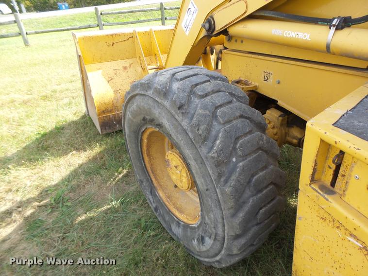 image for item K5603 2003 John Deere 410G backhoe
