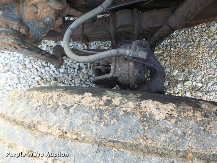 image for item K5606 1999 International 4900 flatbed truck