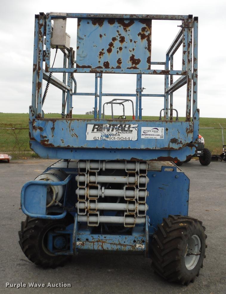 image for item K7710 1999 Genie GS-3268RT scissor lift