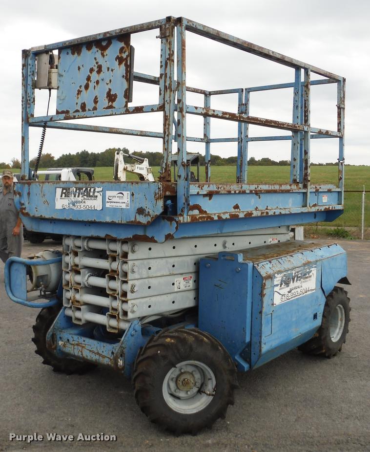 image for item K7710 1999 Genie GS-3268RT scissor lift