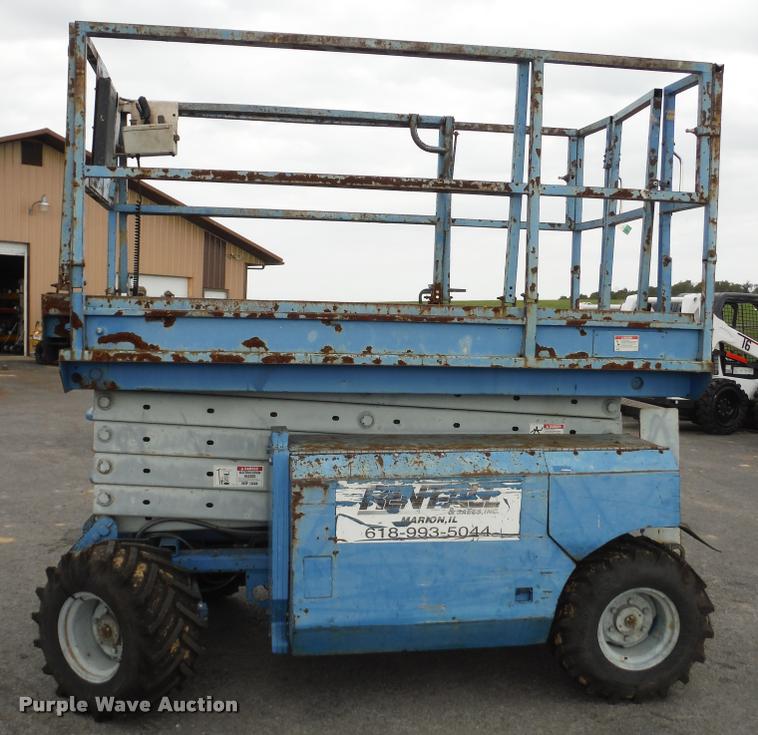 image for item K7710 1999 Genie GS-3268RT scissor lift