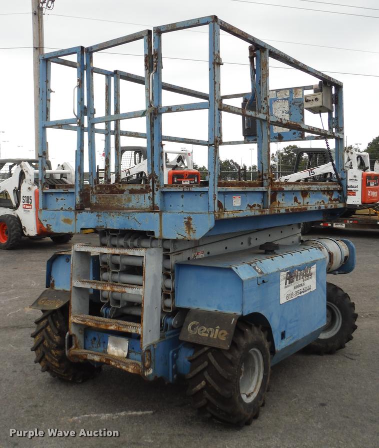 image for item K7710 1999 Genie GS-3268RT scissor lift