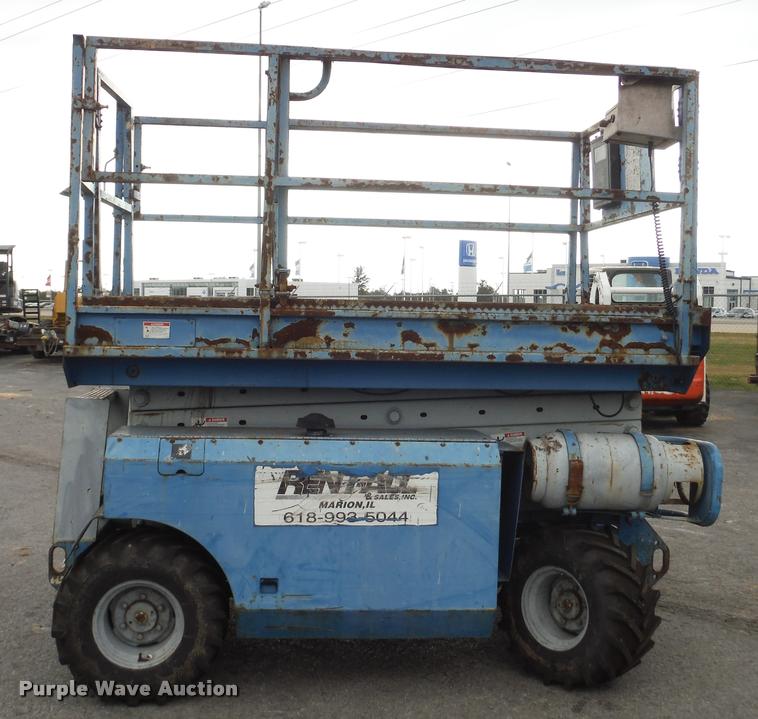 image for item K7710 1999 Genie GS-3268RT scissor lift