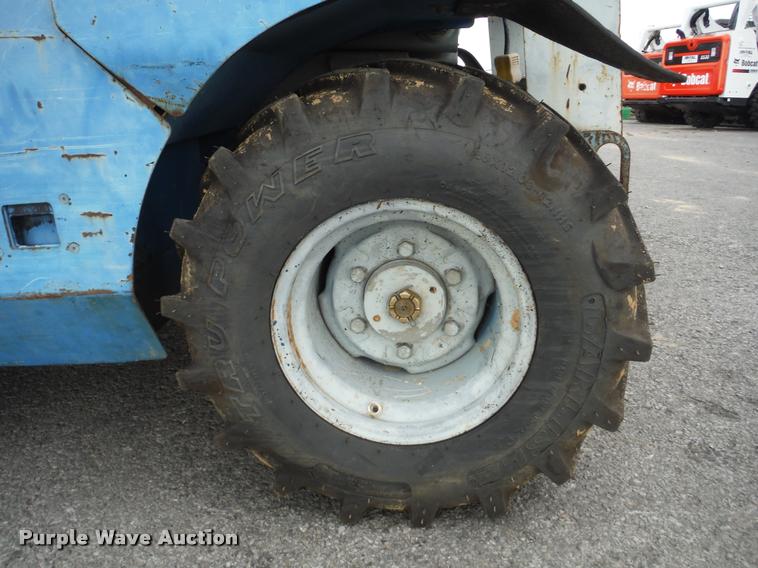 image for item K7710 1999 Genie GS-3268RT scissor lift