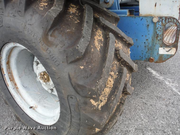 image for item K7710 1999 Genie GS-3268RT scissor lift