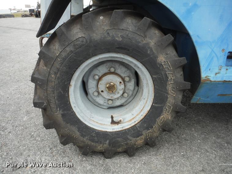 image for item K7710 1999 Genie GS-3268RT scissor lift