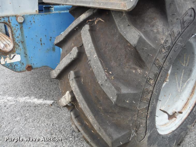 image for item K7710 1999 Genie GS-3268RT scissor lift