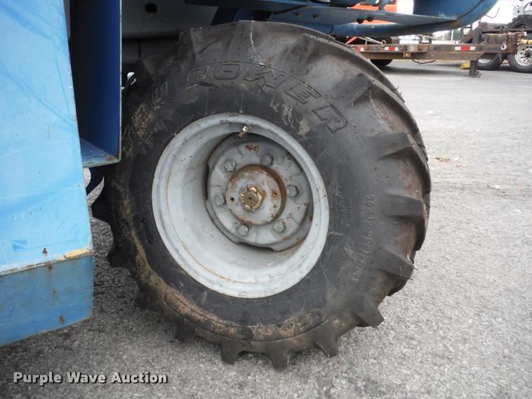 image for item K7710 1999 Genie GS-3268RT scissor lift