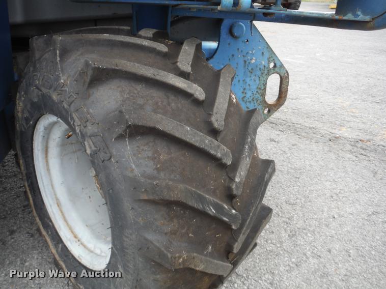 image for item K7710 1999 Genie GS-3268RT scissor lift