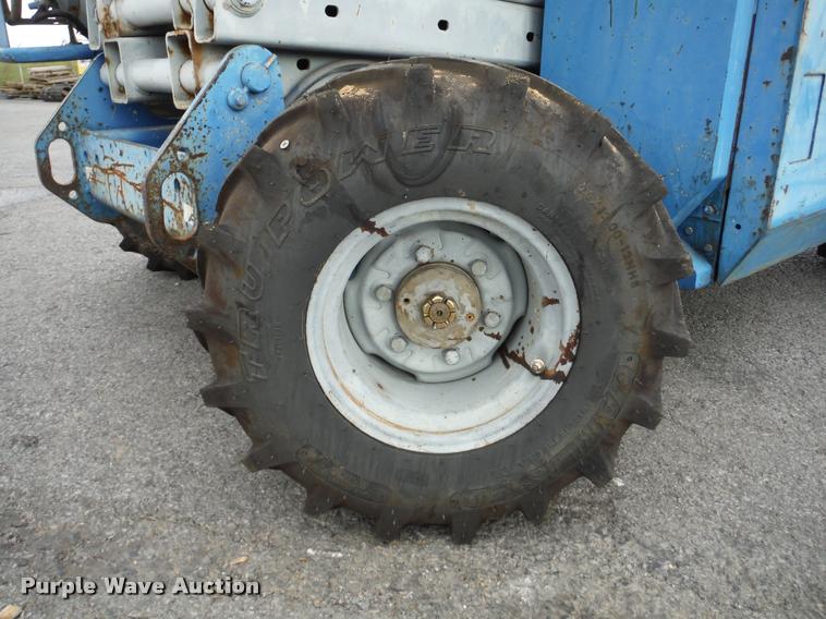 image for item K7710 1999 Genie GS-3268RT scissor lift