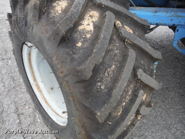 image for item K7710 1999 Genie GS-3268RT scissor lift