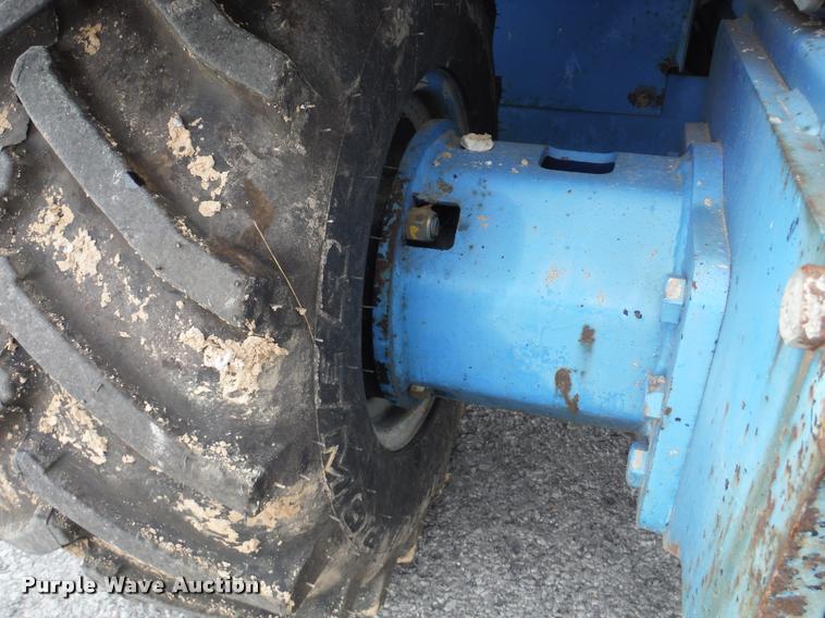 image for item K7710 1999 Genie GS-3268RT scissor lift