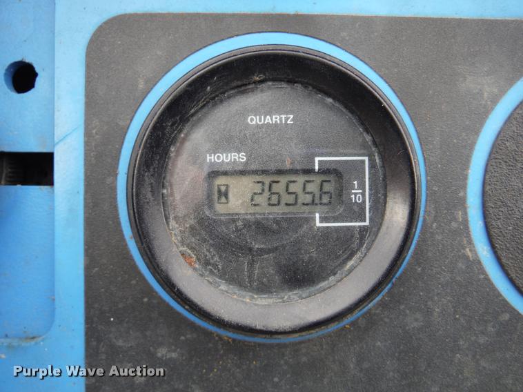 image for item K7710 1999 Genie GS-3268RT scissor lift