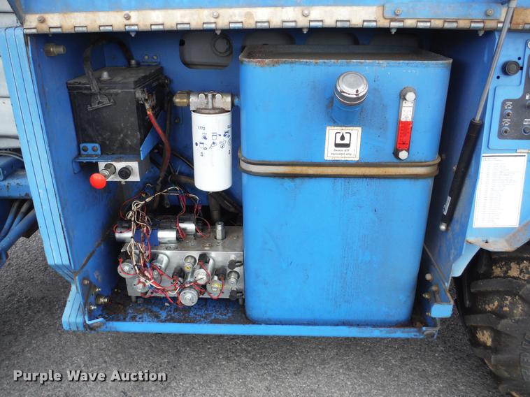 image for item K7710 1999 Genie GS-3268RT scissor lift