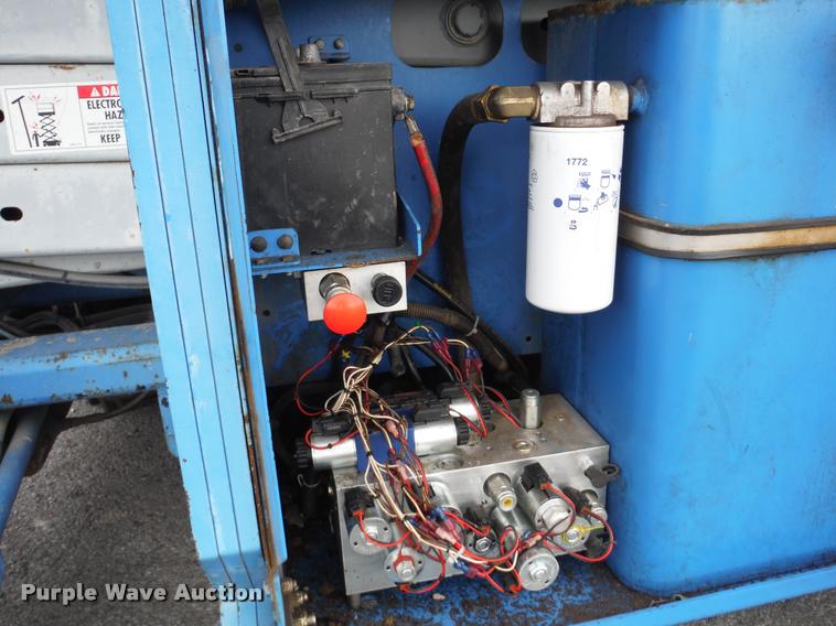 image for item K7710 1999 Genie GS-3268RT scissor lift