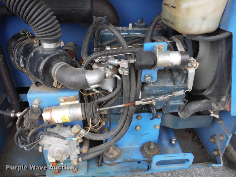 image for item K7710 1999 Genie GS-3268RT scissor lift