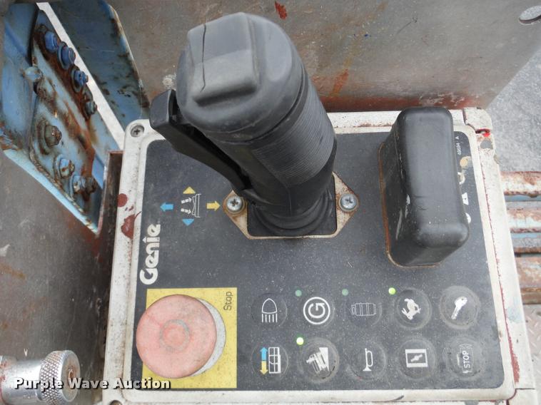 image for item K7710 1999 Genie GS-3268RT scissor lift
