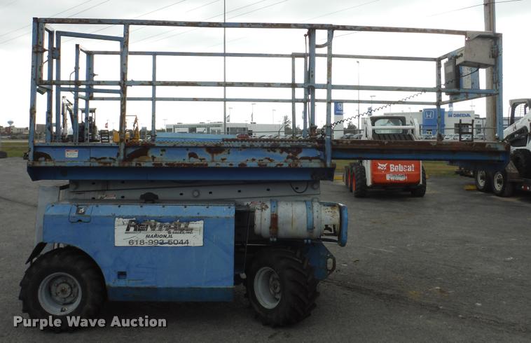image for item K7710 1999 Genie GS-3268RT scissor lift