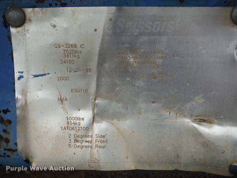 image for item K7710 1999 Genie GS-3268RT scissor lift