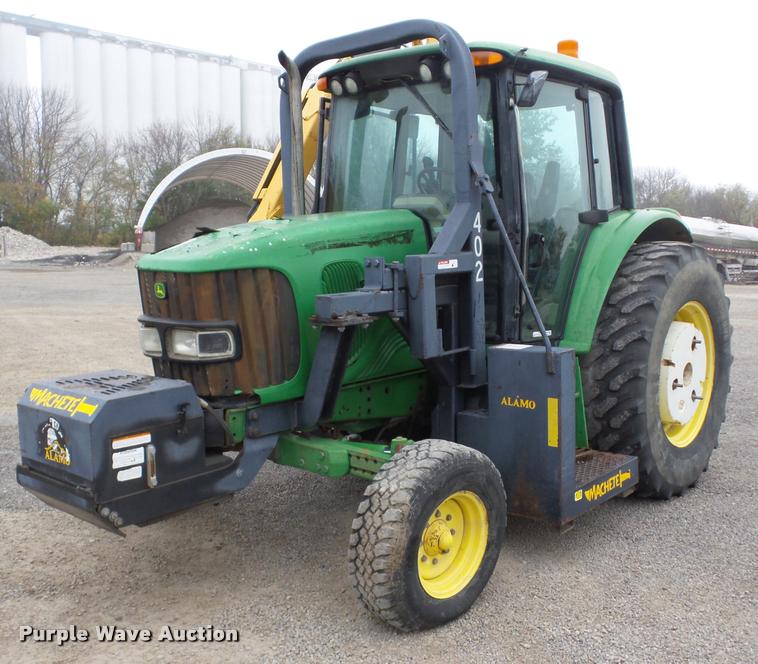 image for item AG9164 2002 John Deere 6320 tractor