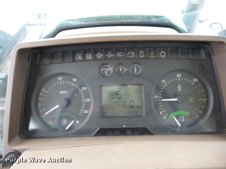 image for item AG9164 2002 John Deere 6320 tractor