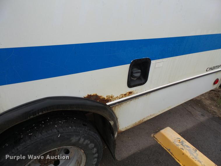 image for item DA3765 2001 Ford Econoline E350 Super Duty Champion shuttle bus