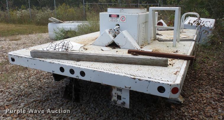 image for item L4291 12'L x 8'W bucket bed