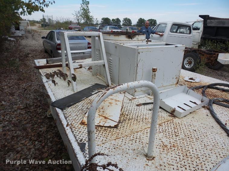 image for item L4291 12'L x 8'W bucket bed