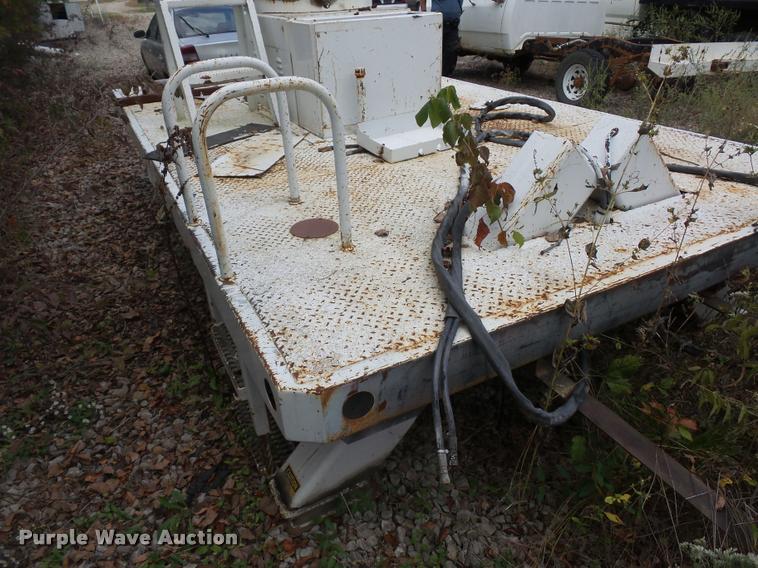 image for item L4291 12'L x 8'W bucket bed