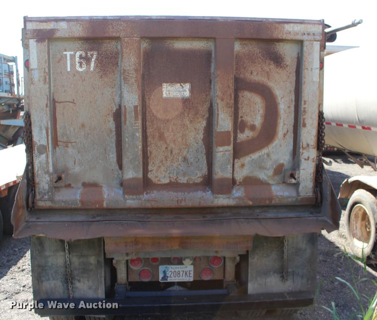 image for item DB0064 2003 Hilbilt barrel end dump trailer