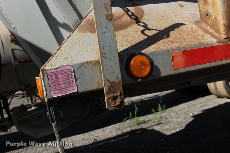 image for item DB0064 2003 Hilbilt barrel end dump trailer