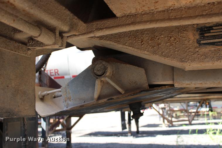 image for item DB0064 2003 Hilbilt barrel end dump trailer