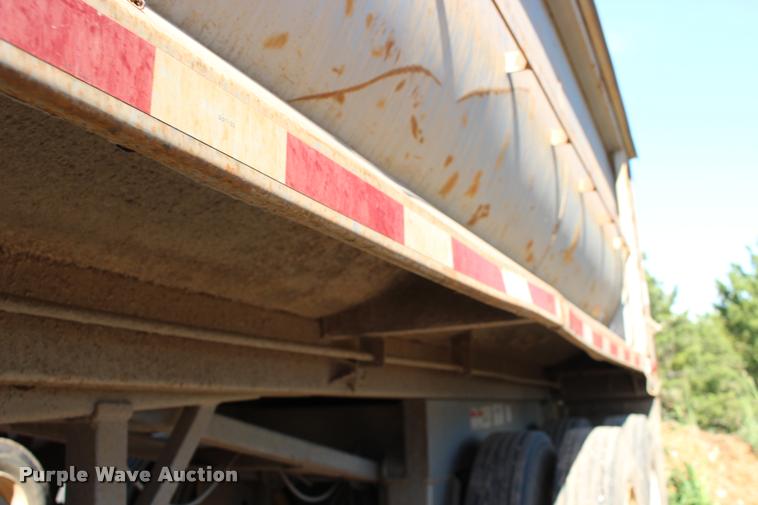 image for item DB0064 2003 Hilbilt barrel end dump trailer