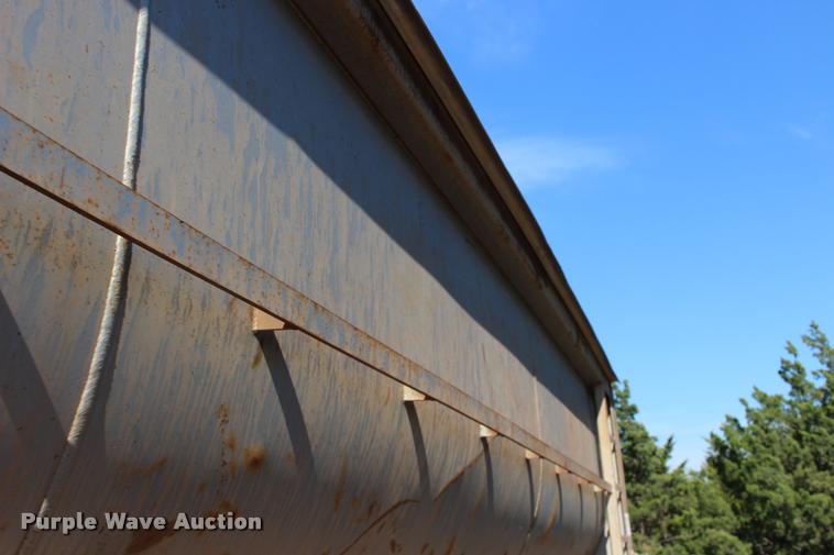 image for item DB0064 2003 Hilbilt barrel end dump trailer