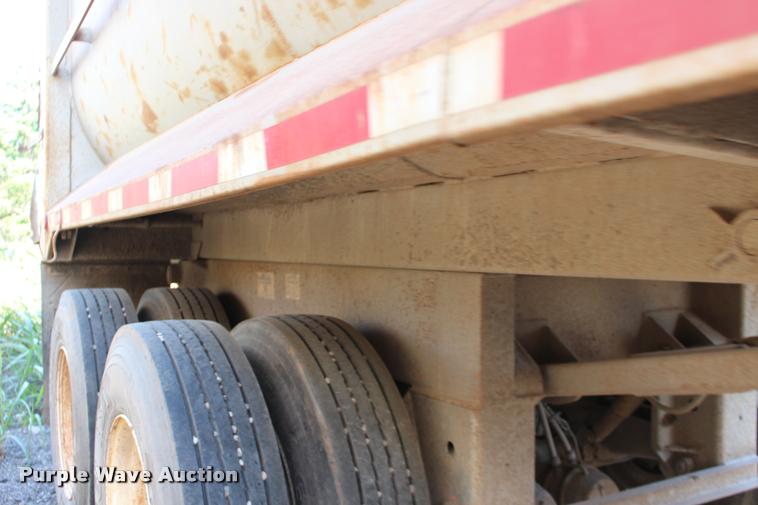 image for item DB0064 2003 Hilbilt barrel end dump trailer