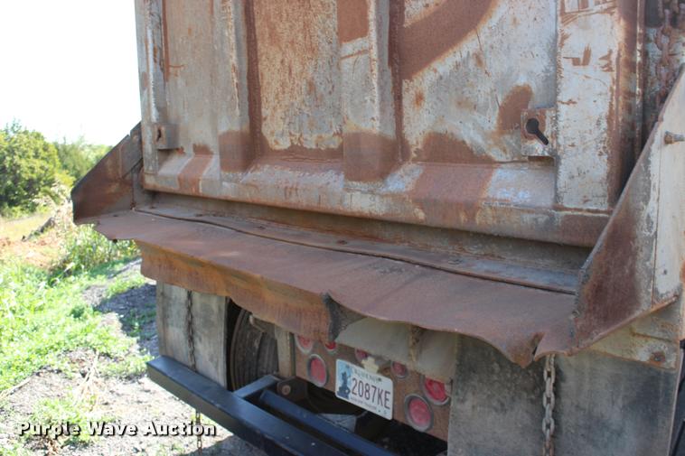 image for item DB0064 2003 Hilbilt barrel end dump trailer