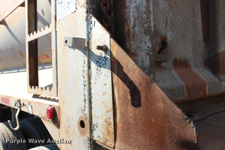 image for item DB0064 2003 Hilbilt barrel end dump trailer