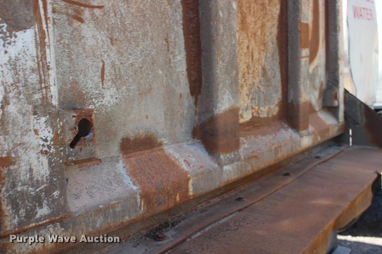 image for item DB0064 2003 Hilbilt barrel end dump trailer