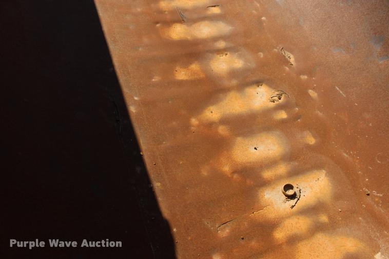 image for item DB0064 2003 Hilbilt barrel end dump trailer