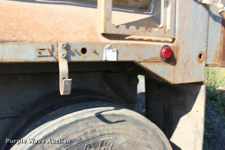 image for item DB0064 2003 Hilbilt barrel end dump trailer