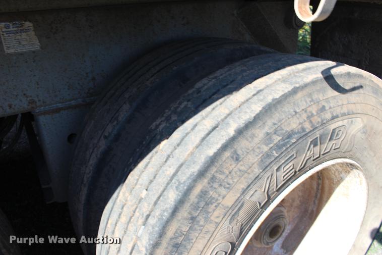 image for item DB0064 2003 Hilbilt barrel end dump trailer