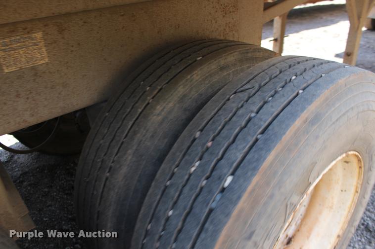 image for item DB0064 2003 Hilbilt barrel end dump trailer