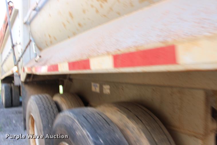 image for item DB0065 2003 Hilbilt barrel end dump trailer