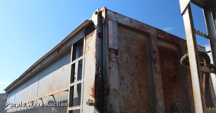 image for item DB0065 2003 Hilbilt barrel end dump trailer