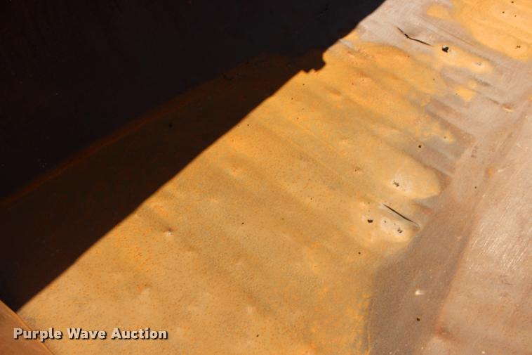 image for item DB0065 2003 Hilbilt barrel end dump trailer