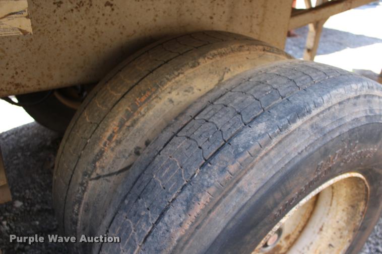 image for item DB0065 2003 Hilbilt barrel end dump trailer