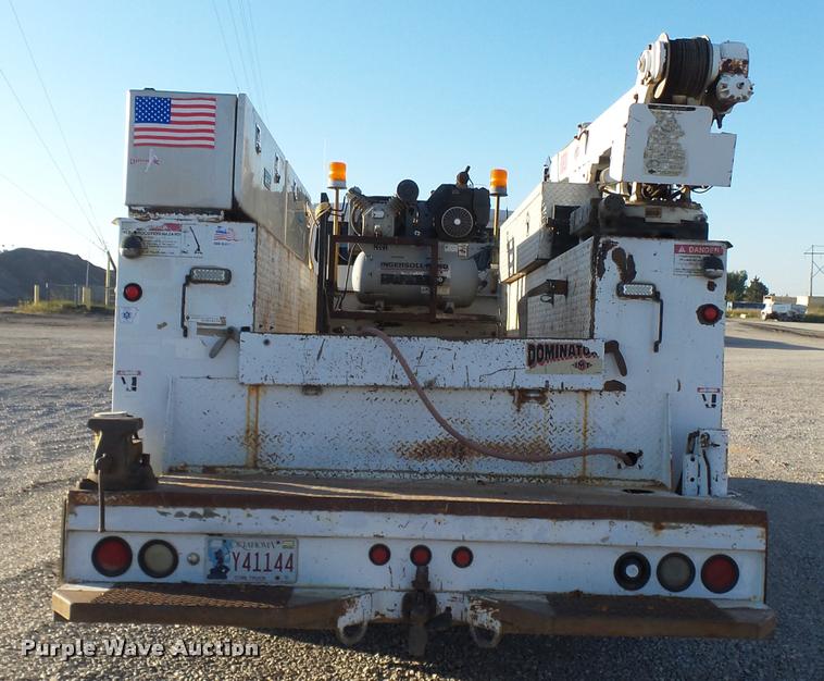 image for item DB0073 2001 Freightliner FL60 service truck with crane